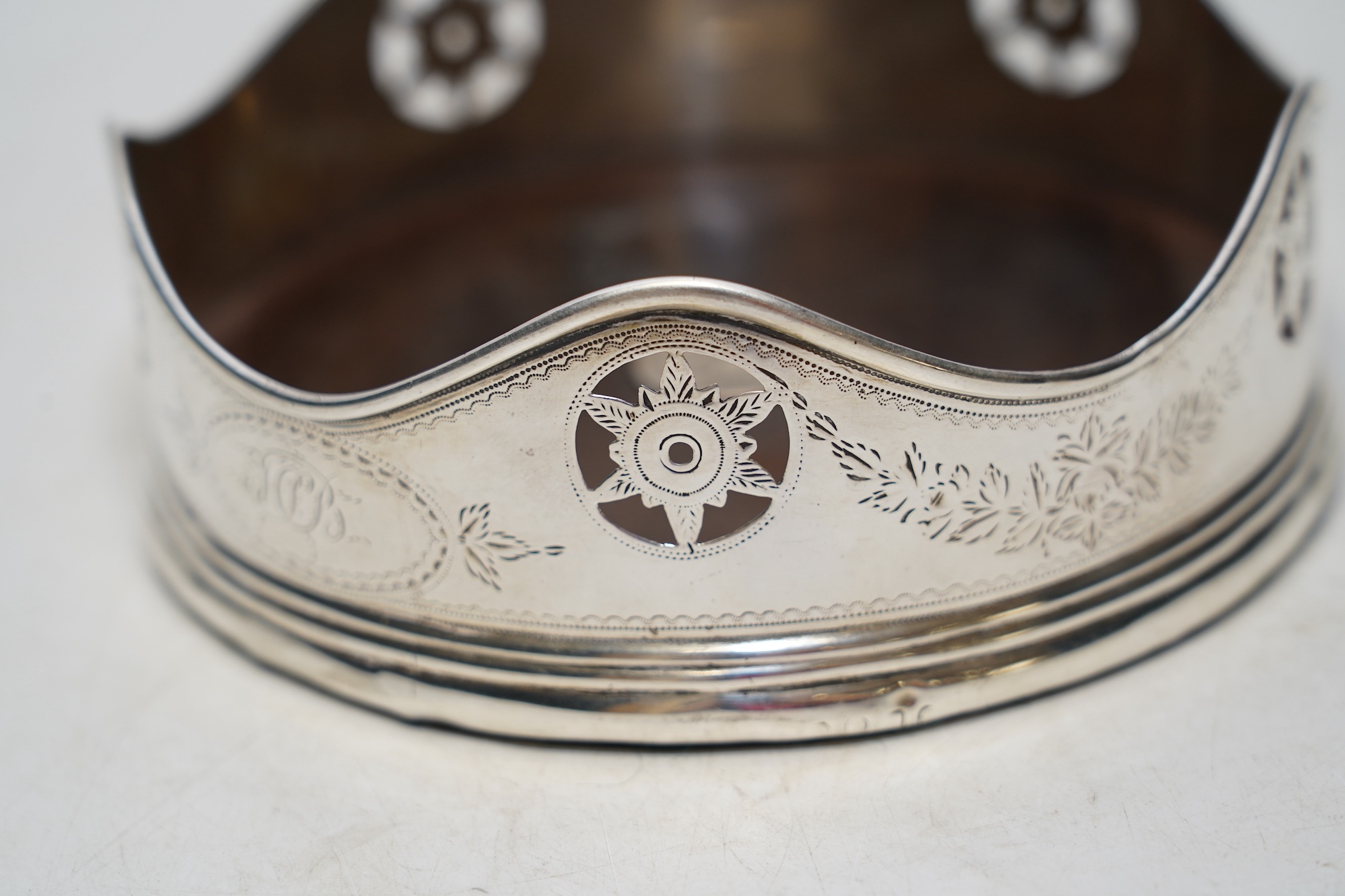 A George III pierced silver mounted wind coaster, marks rubbed. Condition - poor